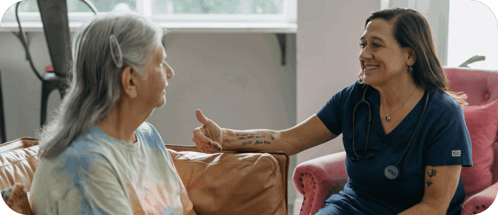 Nurse Gina with a patient - why Nurse Gina